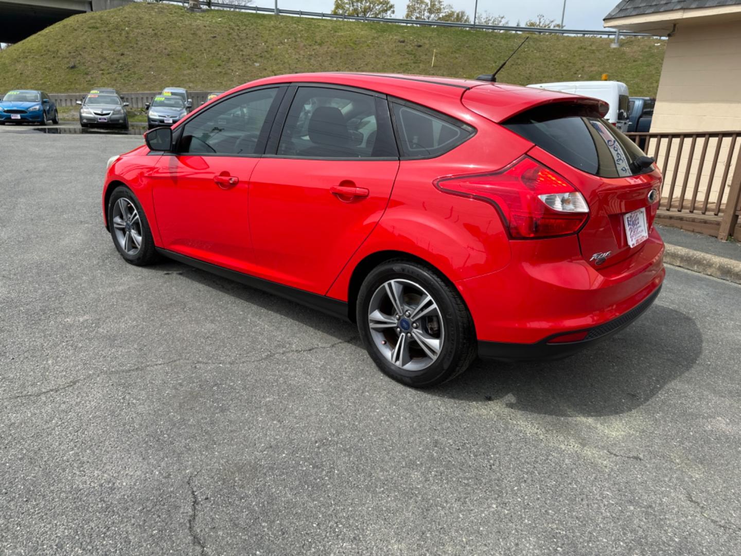 2014 Red Ford Focus (1FADP3K21EL) , Automatic transmission, located at 5700 Curlew Drive, Norfolk, VA, 23502, (757) 455-6330, 36.841885, -76.209412 - Photo#1